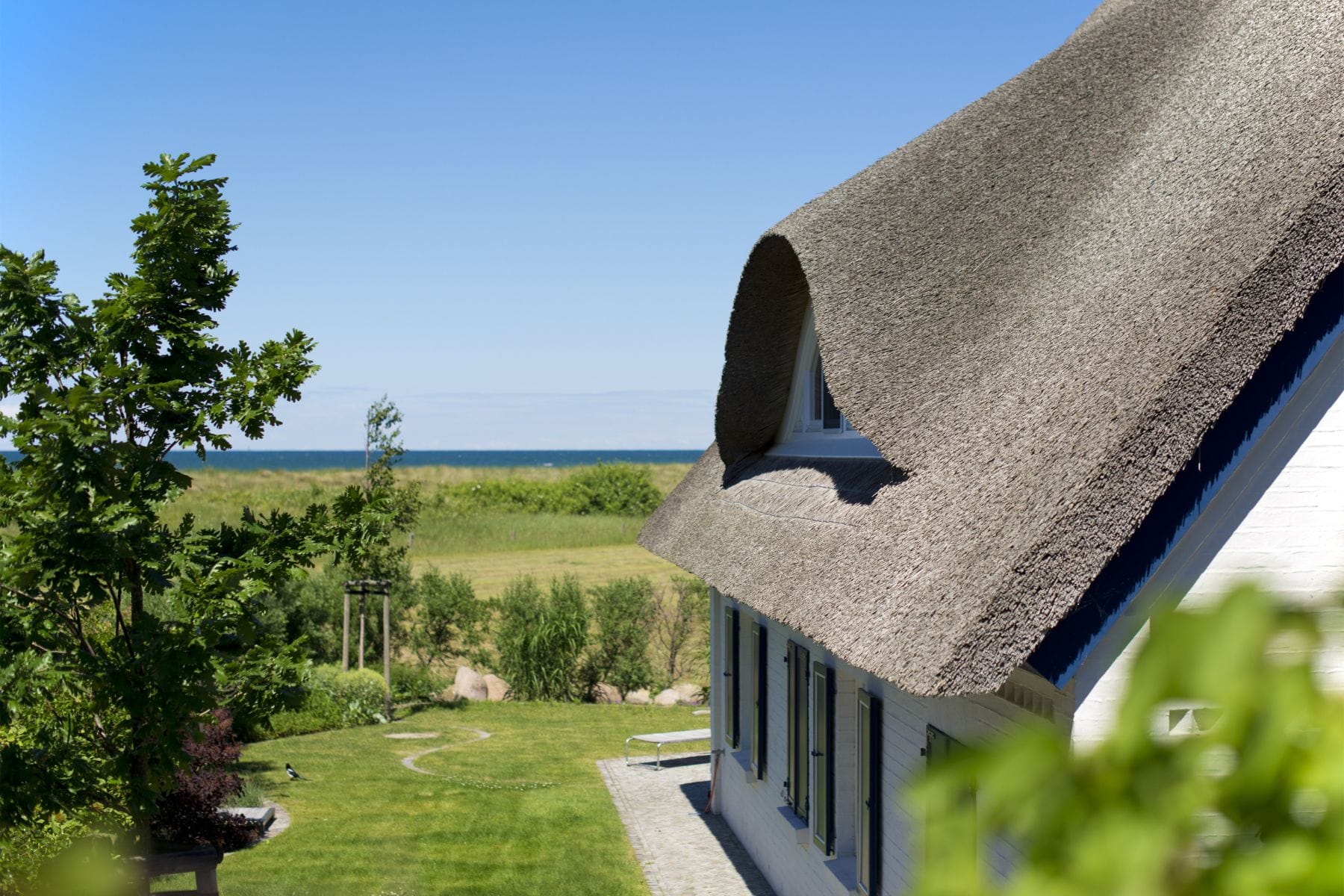 Ferienhaus an der Ostsee mit Garten und Meeresblick.